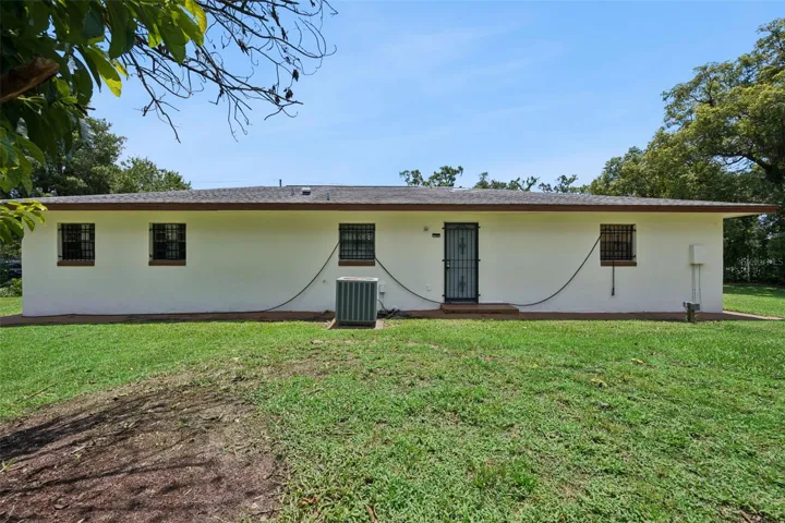 Rear of home with a rear entrance