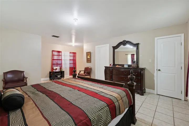 Primary bedroom with 2 walk in closets