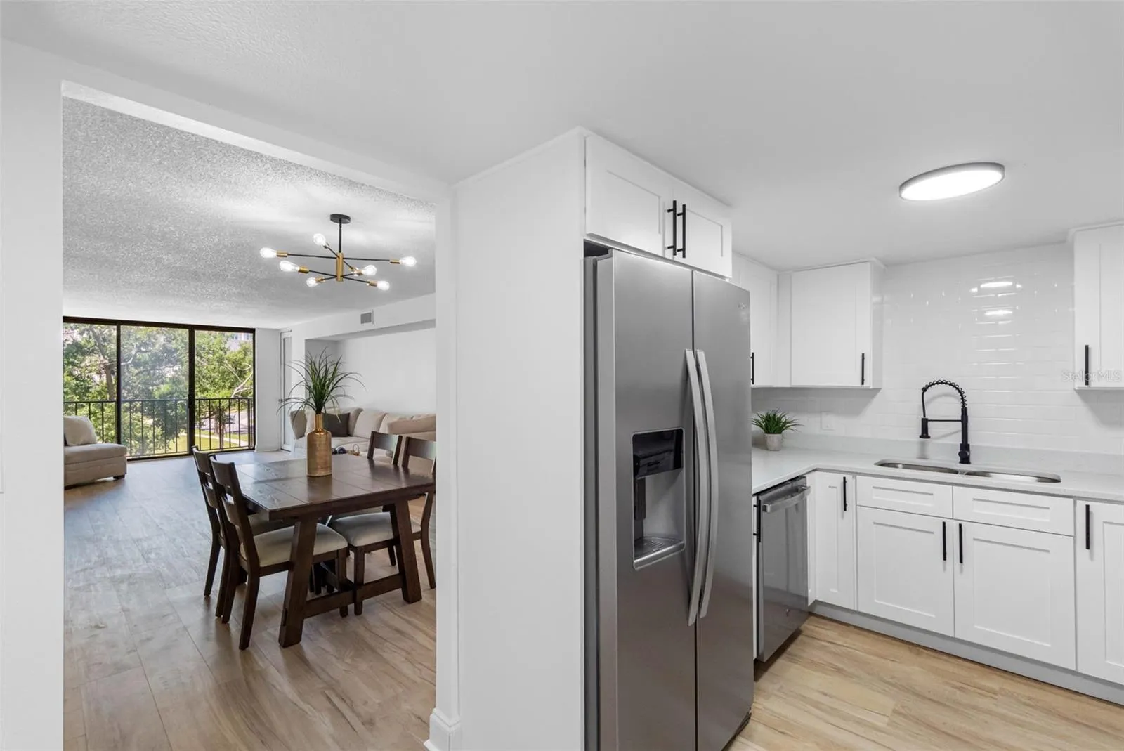 Kitchen is a right off of dining