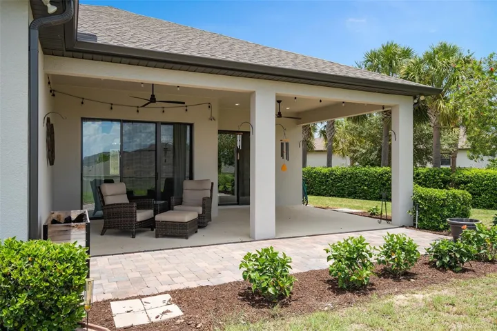 Large Under Roof Lanai with a paver patio