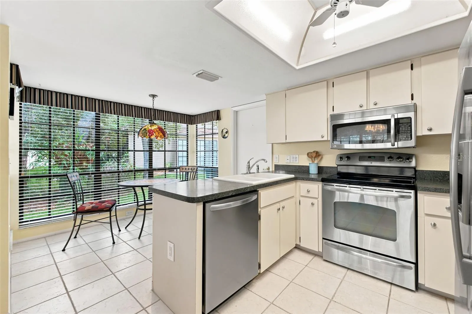 Kitchen view to breakfast nook.