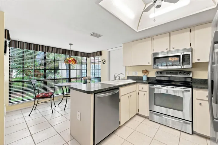 Kitchen view to breakfast nook.