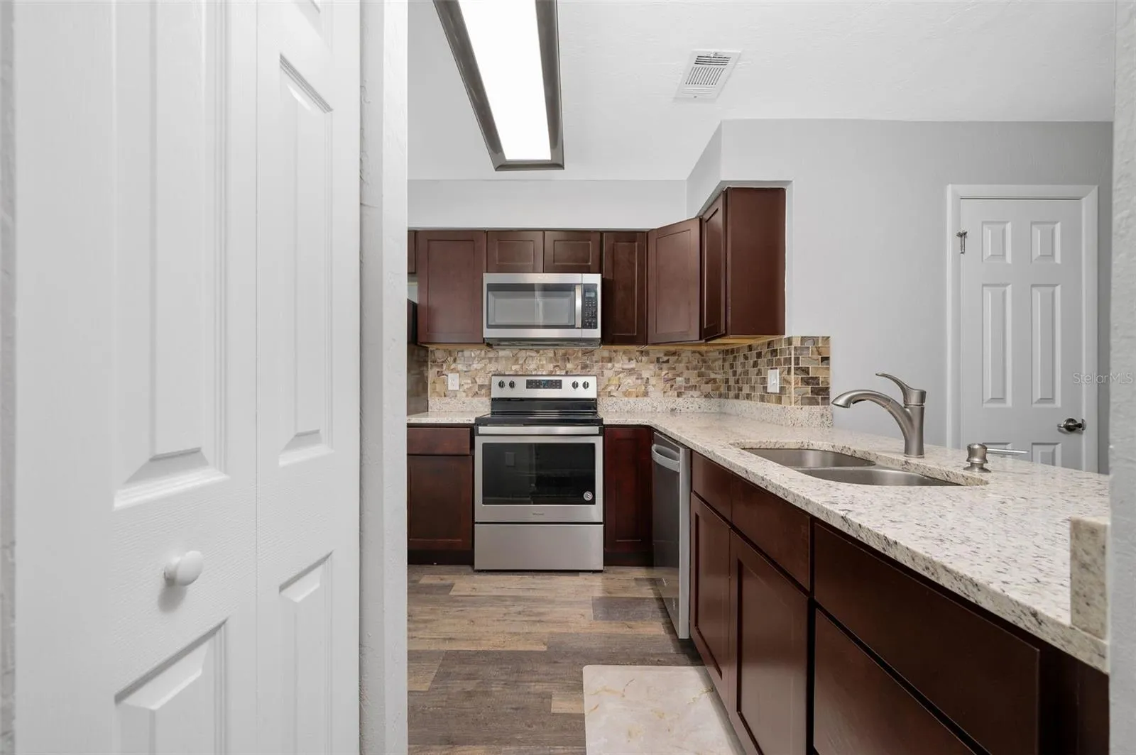 Updated kitchen with granite countertops