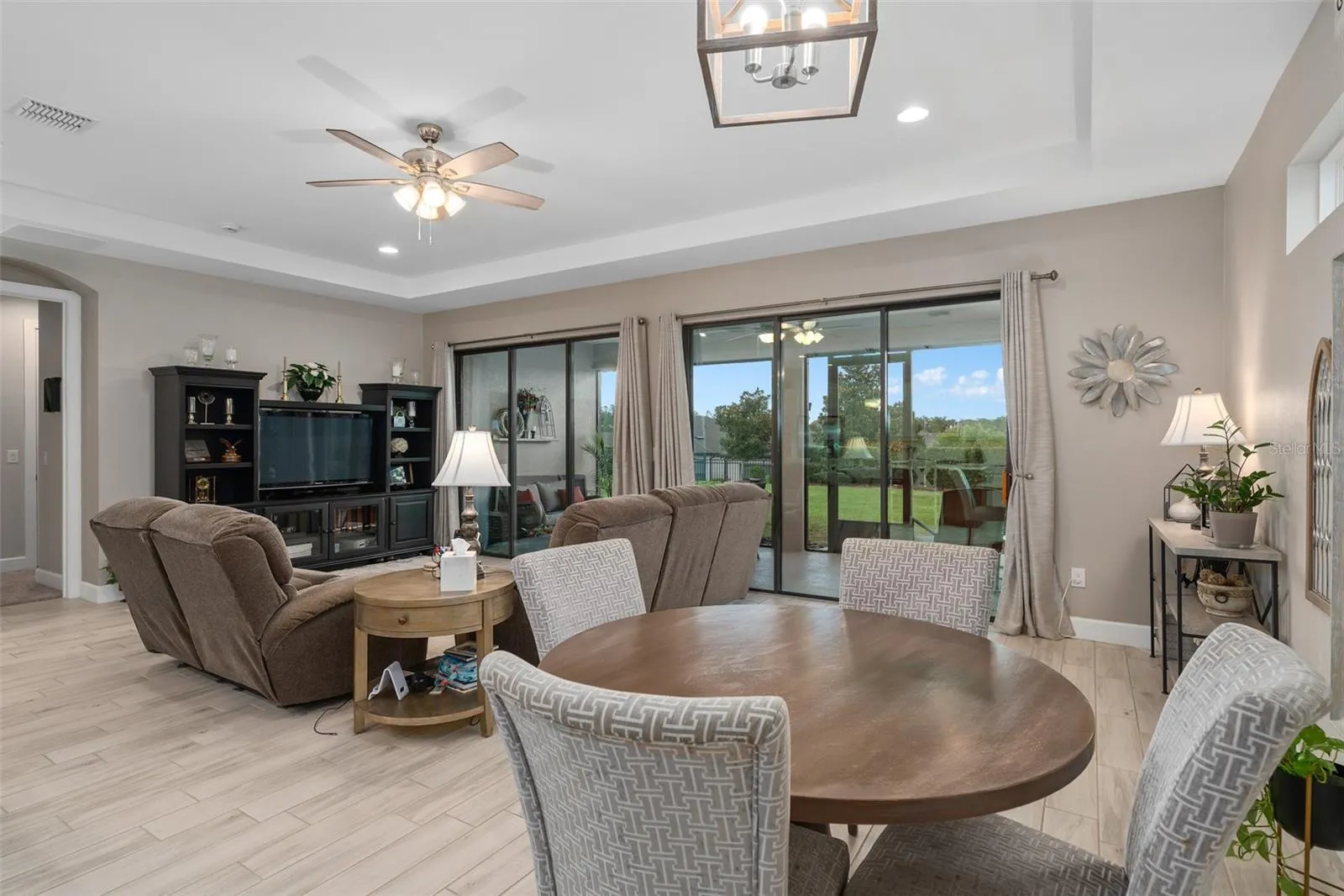 View of the Great Room and Dining Area with Great Views through the Double Sliding Glass Doors