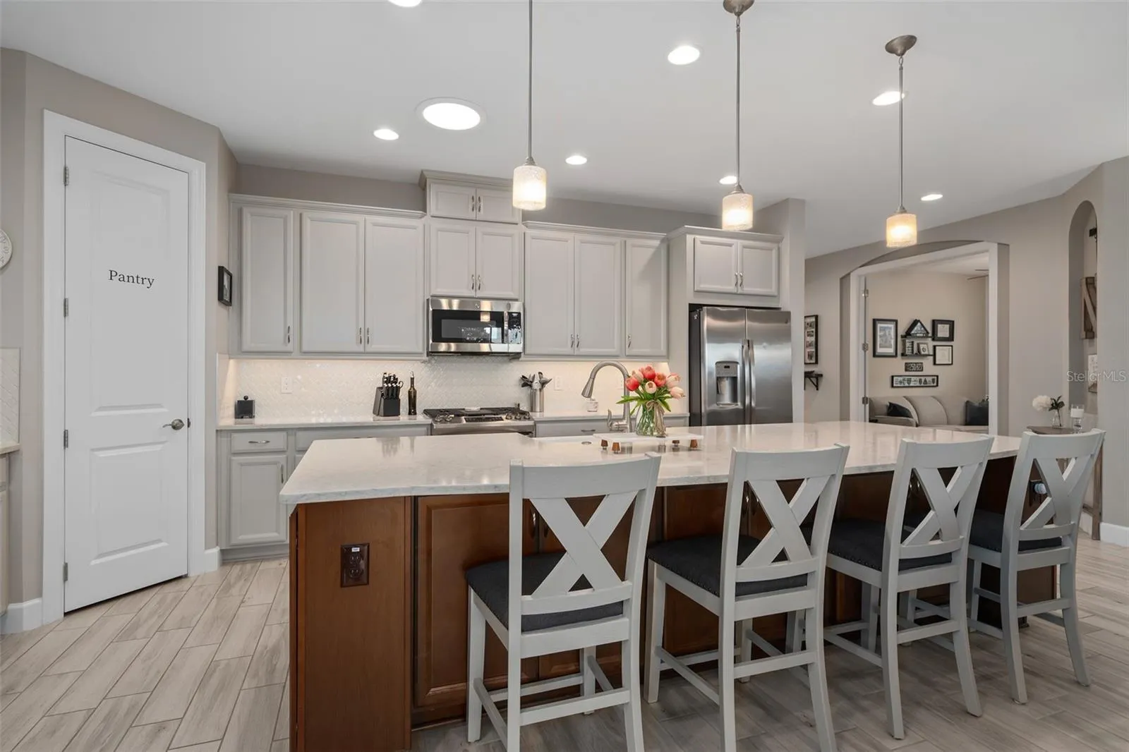 The Island offers Front Facing Cabinets and a Great Breakfast Bar