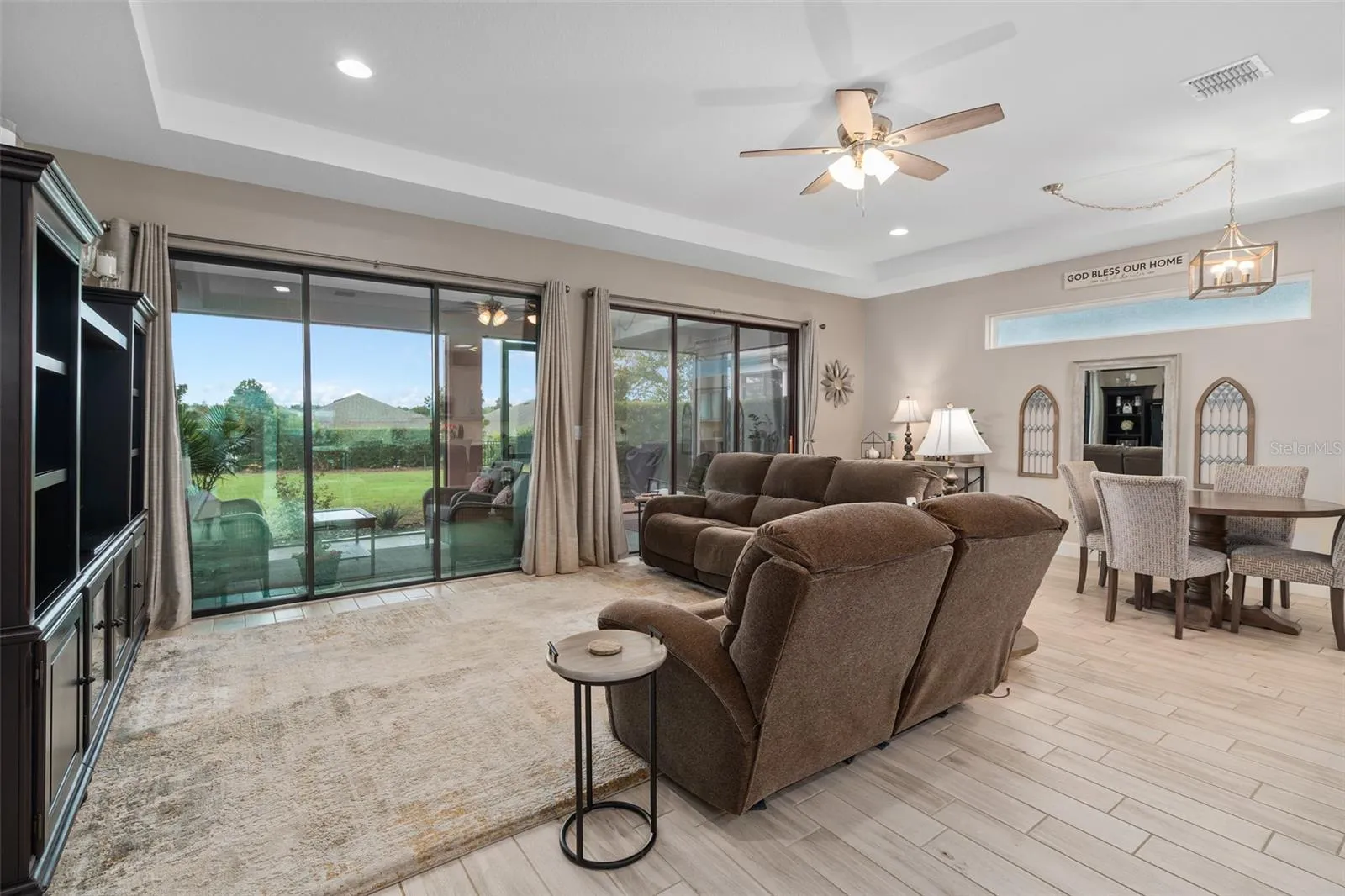 View of the Great Room and Dining Area with Great Views through the Double Sliding Glass Doors