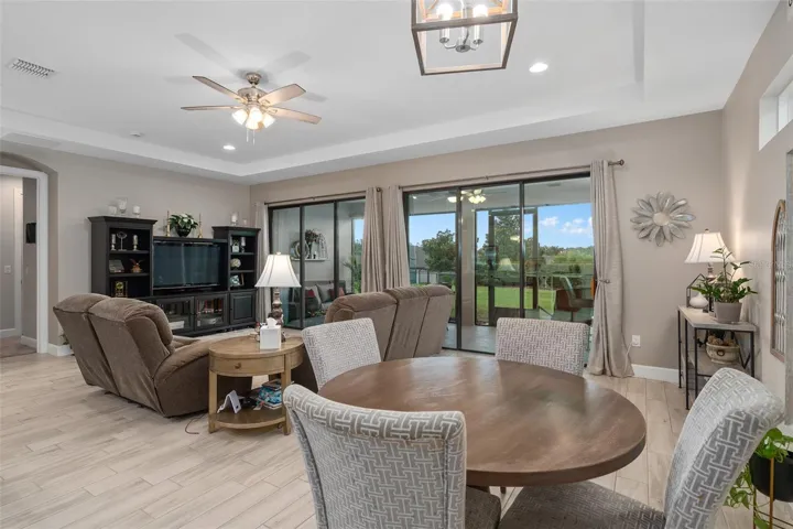 View of the Great Room and Dining Area with Great Views through the Double Sliding Glass Doors