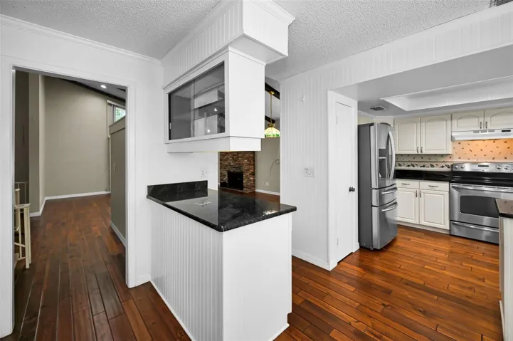 Kitchen buffett or prep table with overhanging cabinet