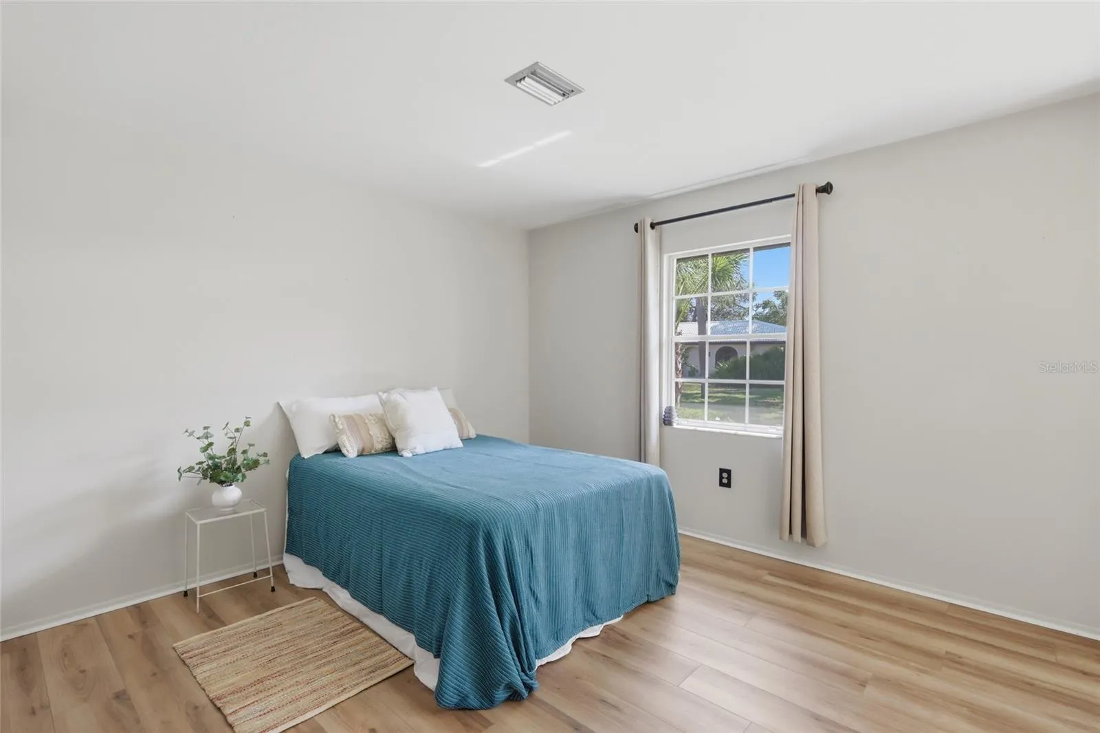 The second bedroom can easily accommodate a king bed and dressers.