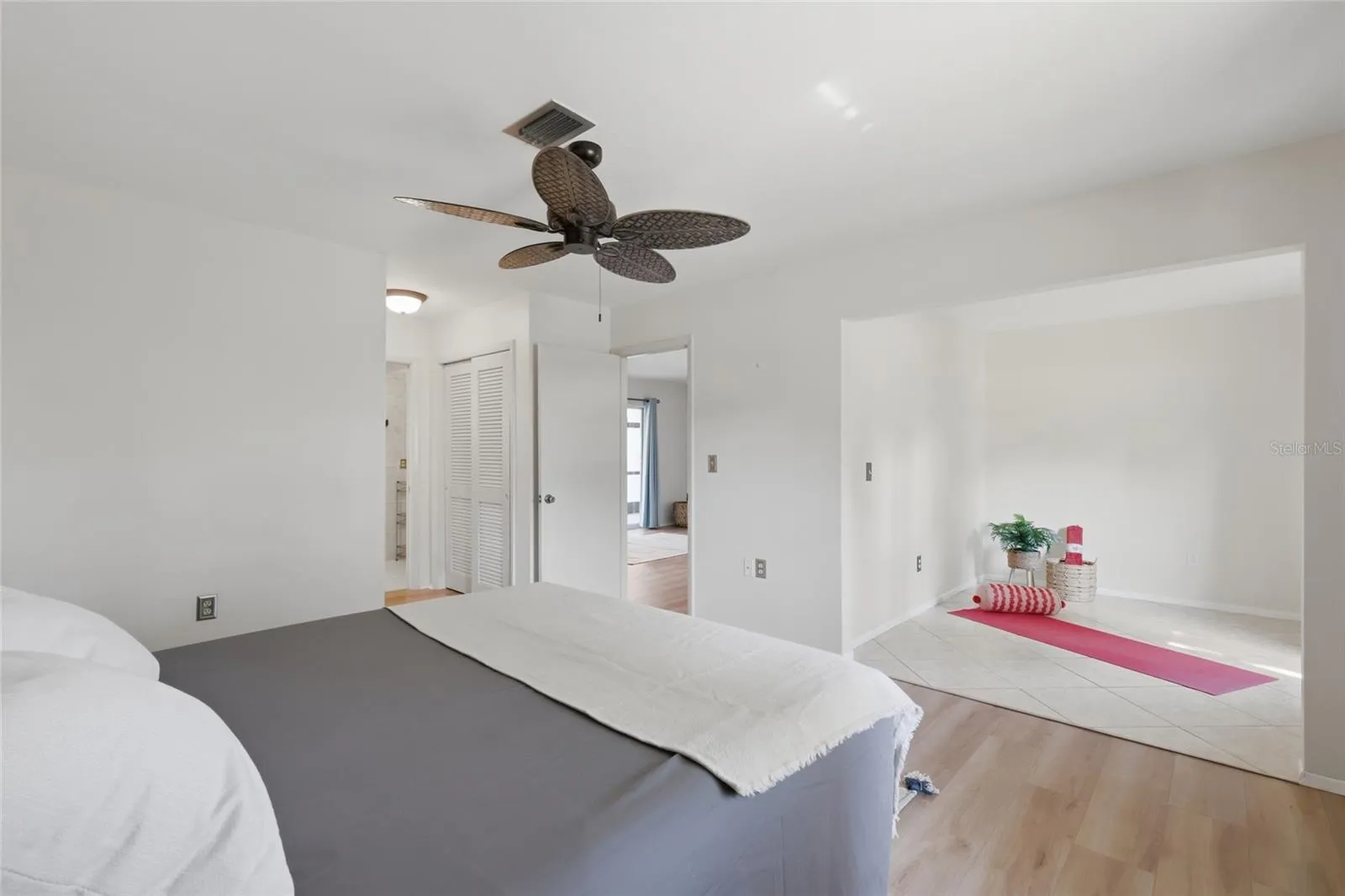 The bonus room off the primary bedroom could be a reading nook, study, or exercise space. Built in linen and additional closet storage leads to the primary bath.