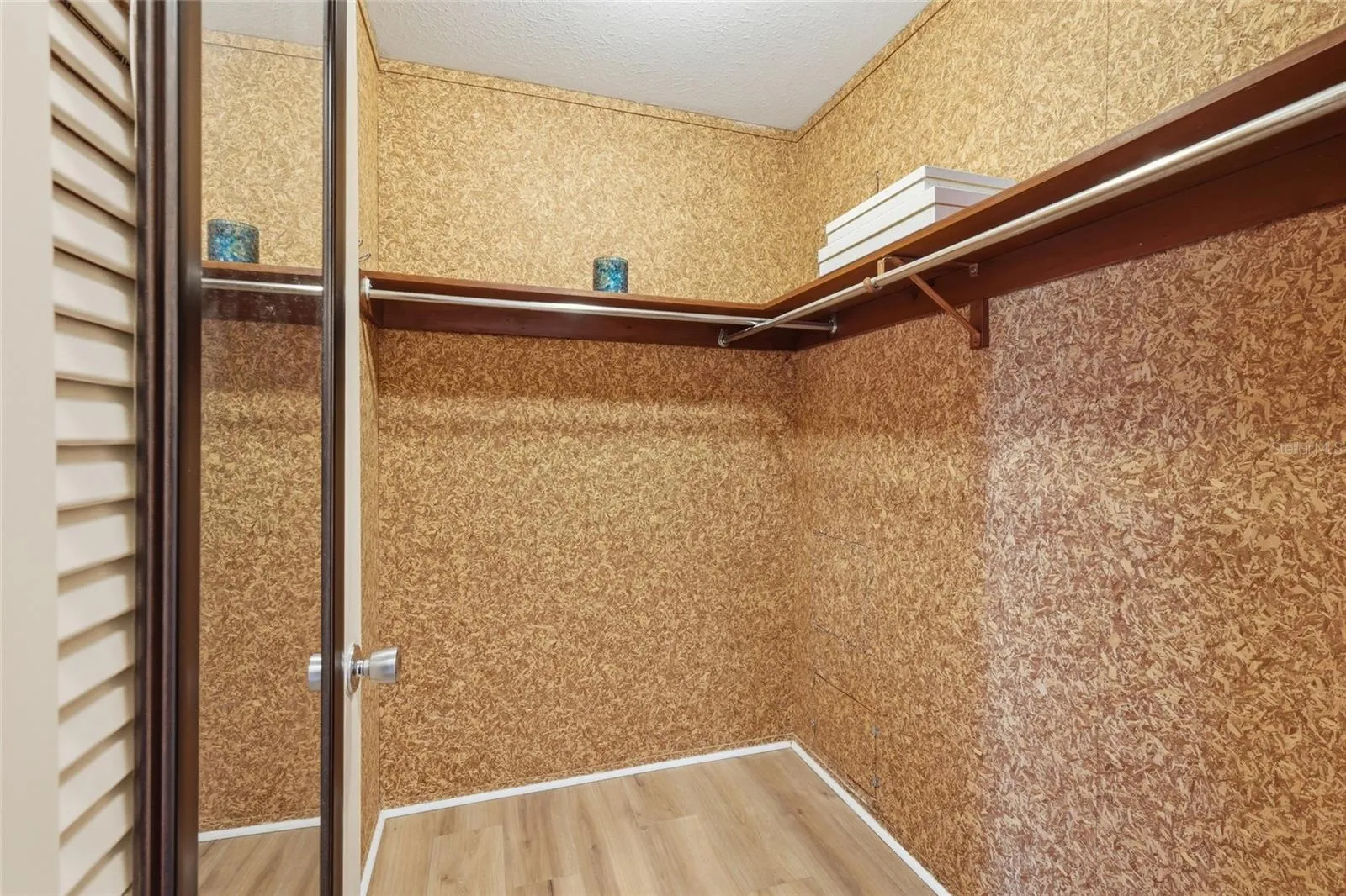Massive walk-in cedar closet in the primary bedroom suite.