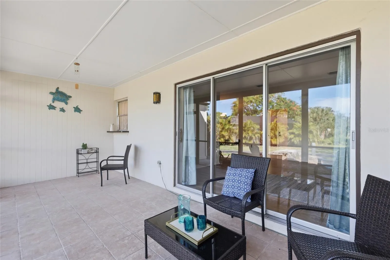 With a kitchen pass-through and plenty of space for a dining table, the lanai makes alfresco meals easy.