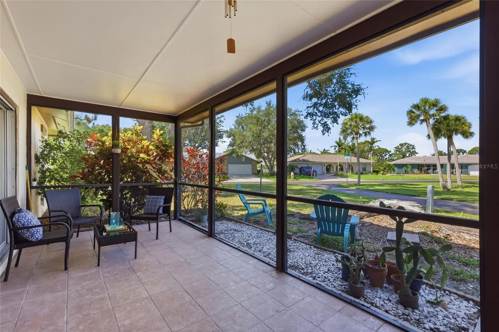 The screened in lanai offers a delightful spot to watch the sunset.