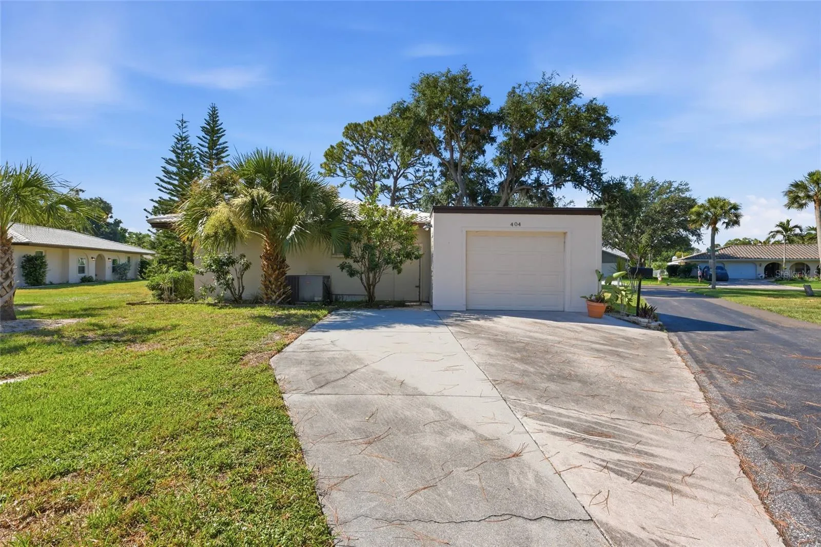 The driveway and garage entrance to the villa.