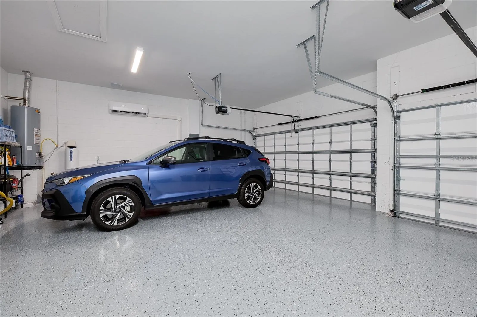 3 Car garage with AC