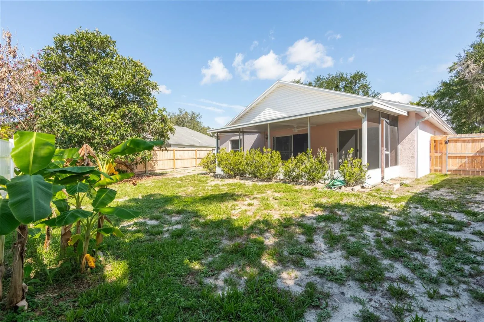 Large fenced in backyard.