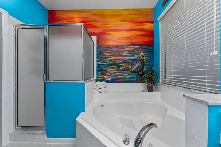 Primary Bathroom with Separate Spa Tub and Shower