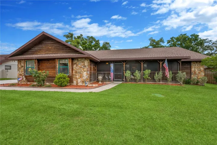 4-bedroom, 3-bath pool home with an oversized 2-car side entry garage.