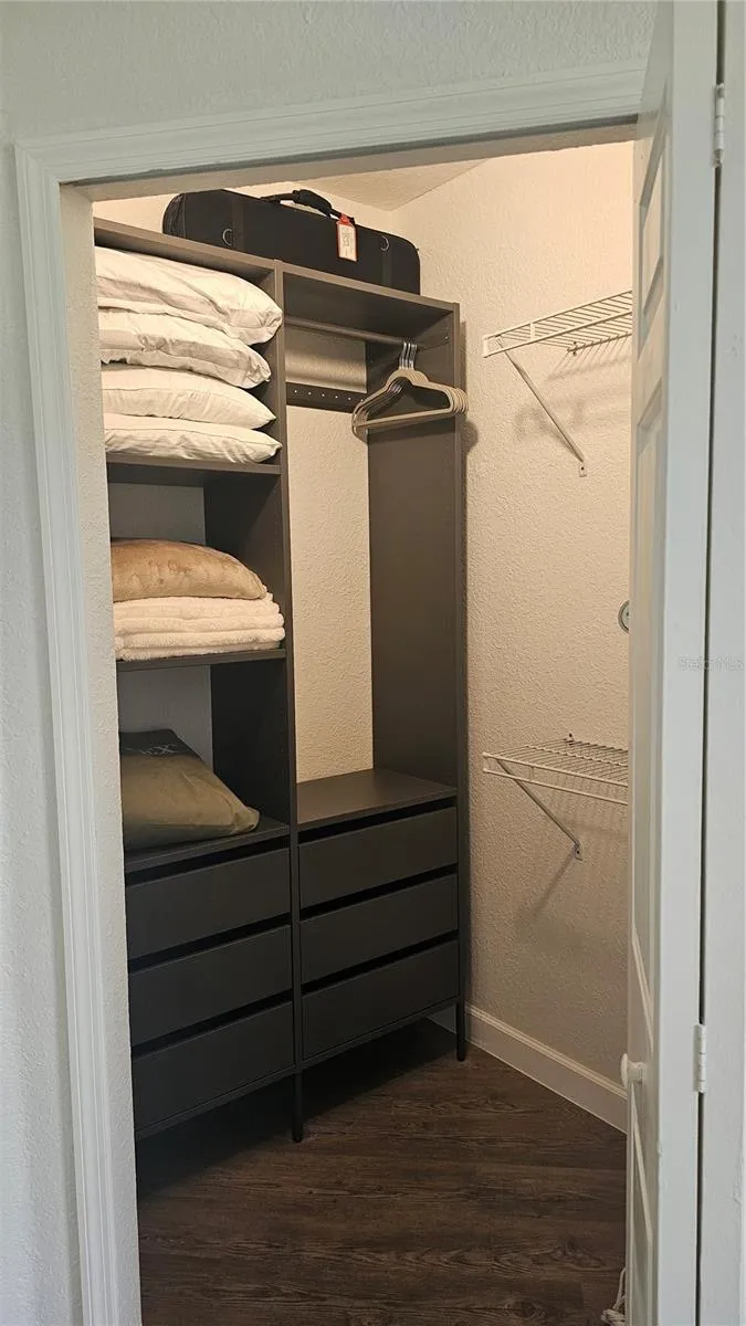 Closet with built in bedroom 2