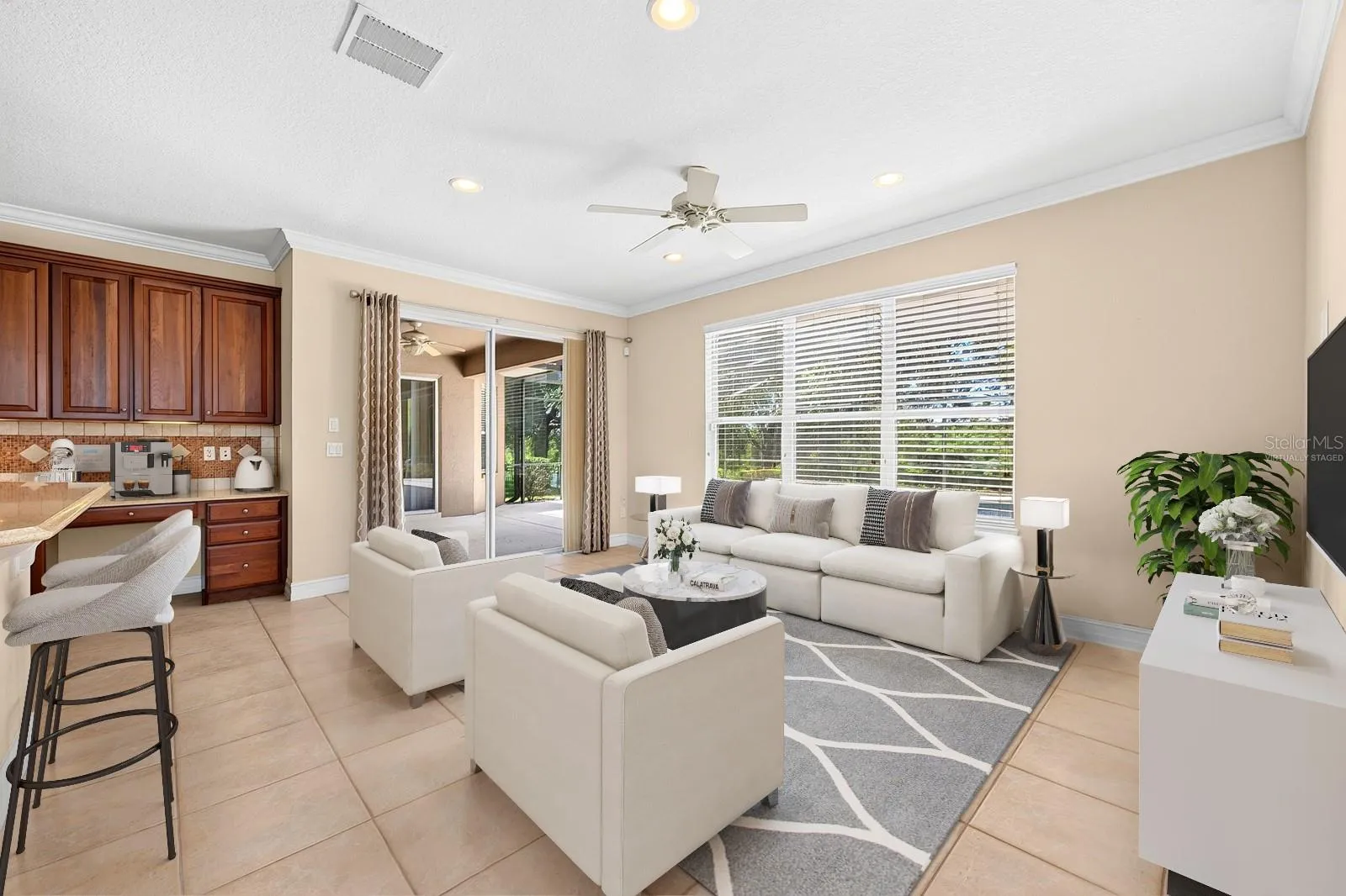 Gather in the family room. Virtually Staged.