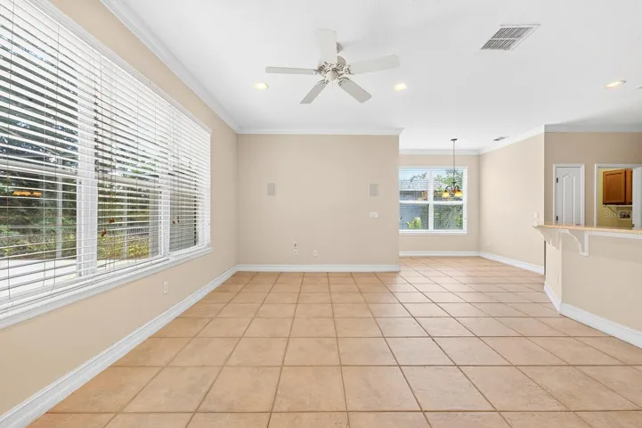 Family room is open to the kitchen and a light filled breakfast nook.