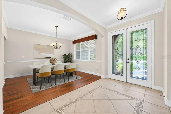 Foyer opens to a formal dining space, hosting family and friends is a breeze. Virtually Staged.