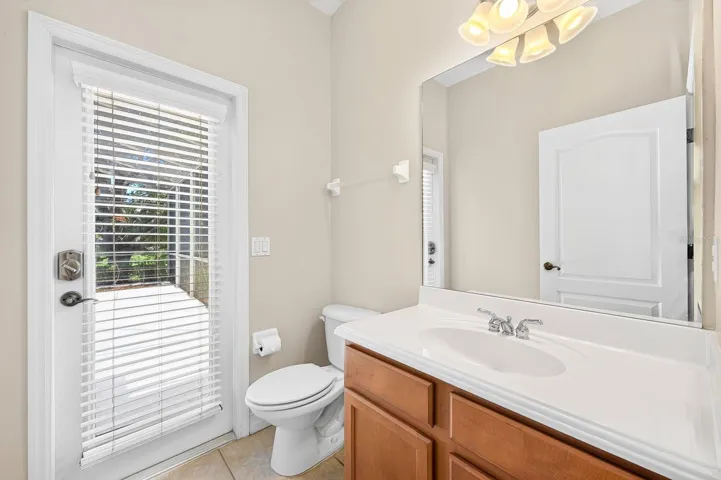 Convenient main floor half bath with pool access.