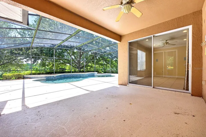 Relax and unwind poolside under the covered lanai.