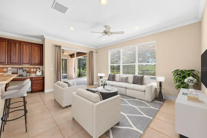 Gather in the family room. Virtually Staged.