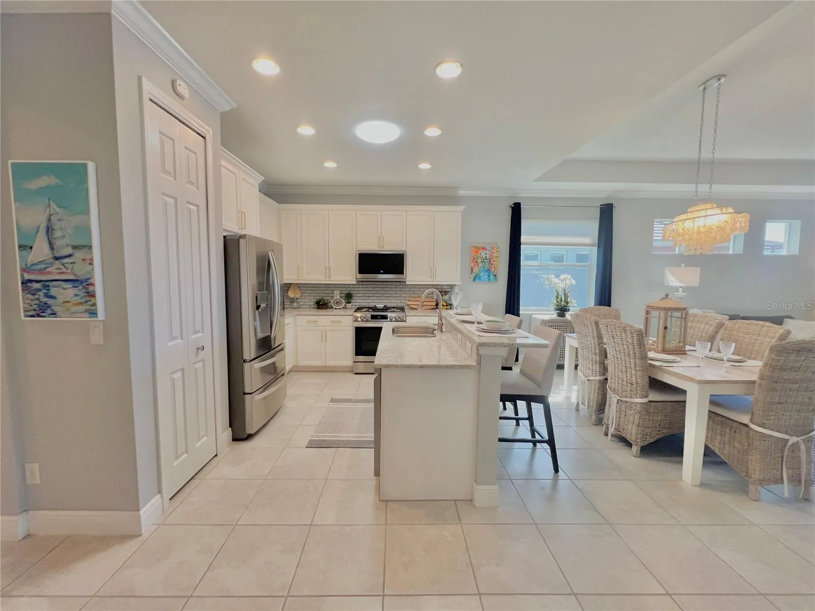 Kitchen with modern LG appliances and eat in island.