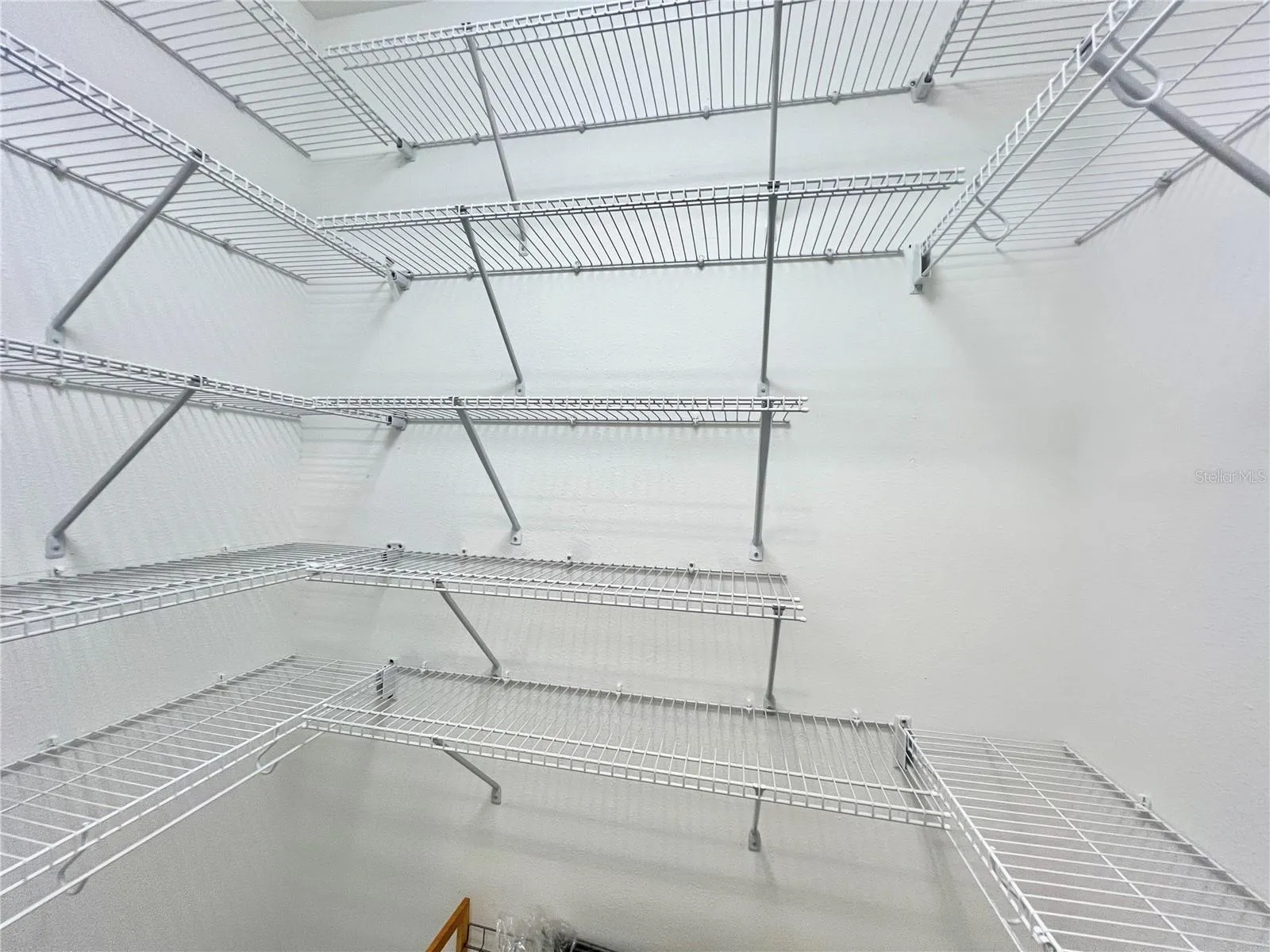 One of Two Walk-In Closets on way to the EnSuite Primary Bath.