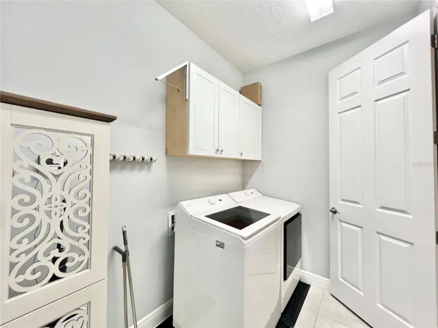 Laundry room with plenty of space and storage!