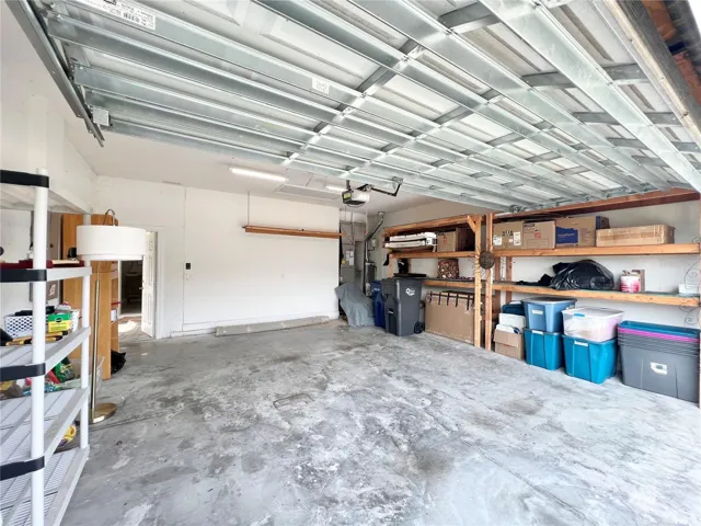 Large Garage with Storage and Hurricane Shutters stored.