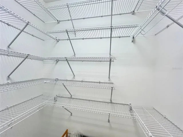 One of Two Walk-In Closets on way to the EnSuite Primary Bath.