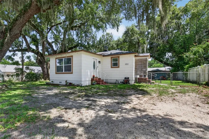 This large lot with nice trees offers many options - Roof is only 2 years old!