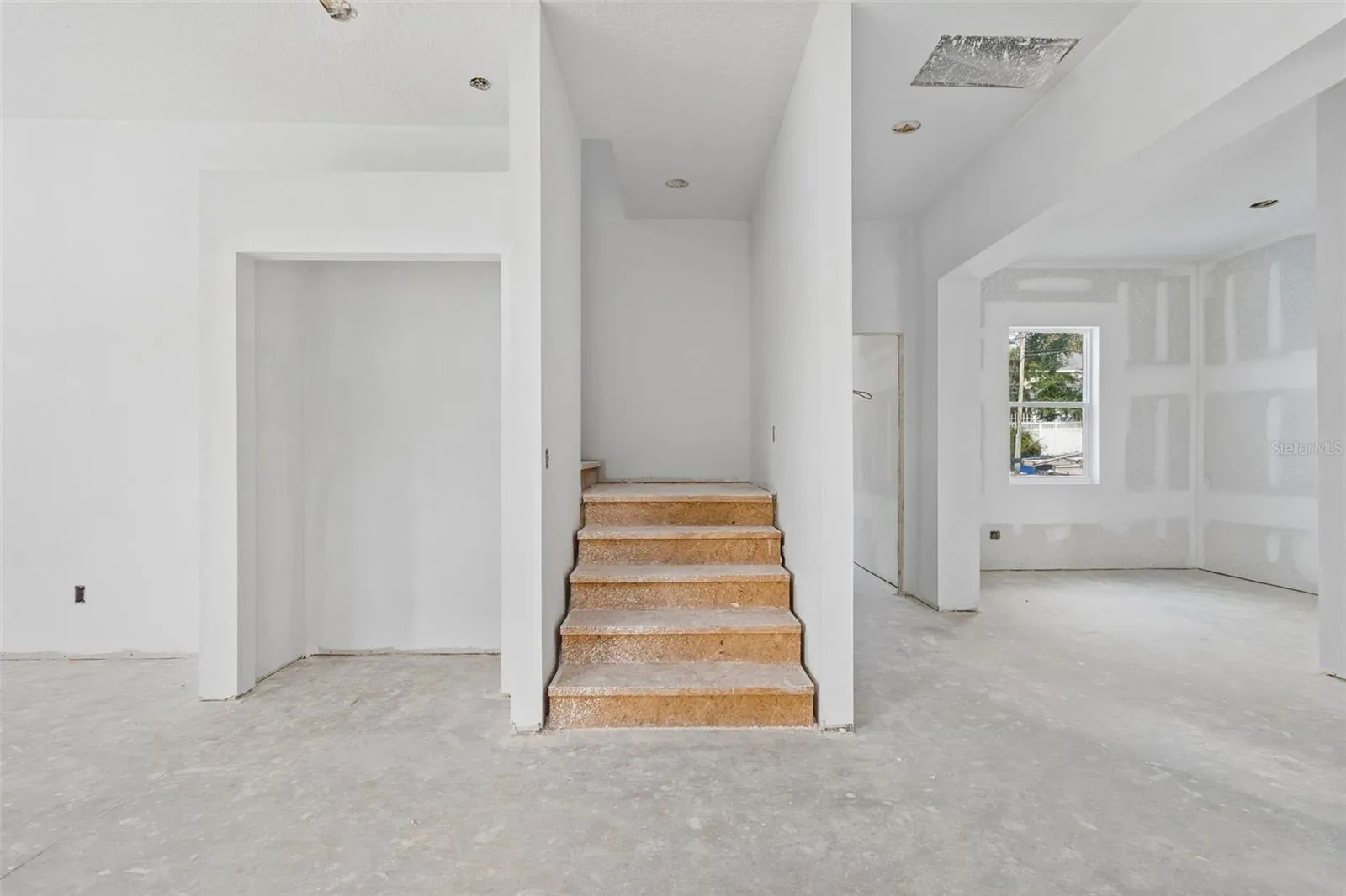 Laundry room, office space and powder bath the right of the stair case on 1st floor, along with the back entrance door