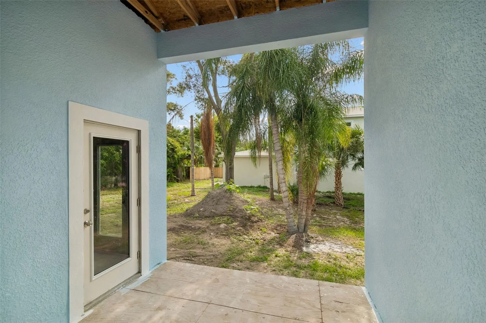 Breezeway between garage door and back entrance door