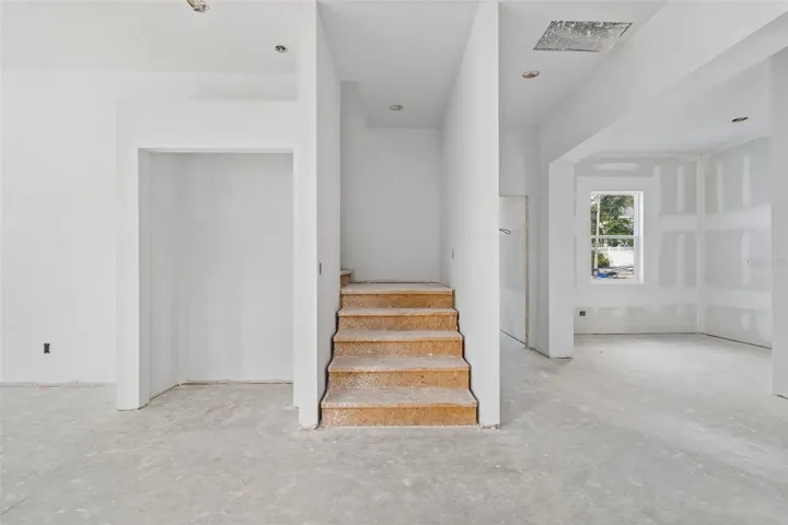 Laundry room, office space and powder bath the right of the stair case on 1st floor, along with the back entrance door