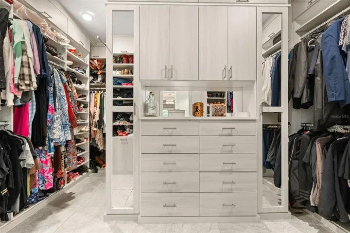 Primary closet with custom built ins