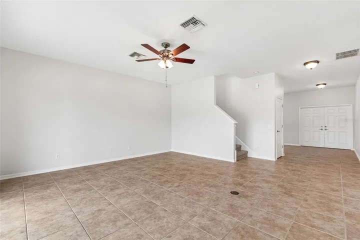 family room leading to stairs