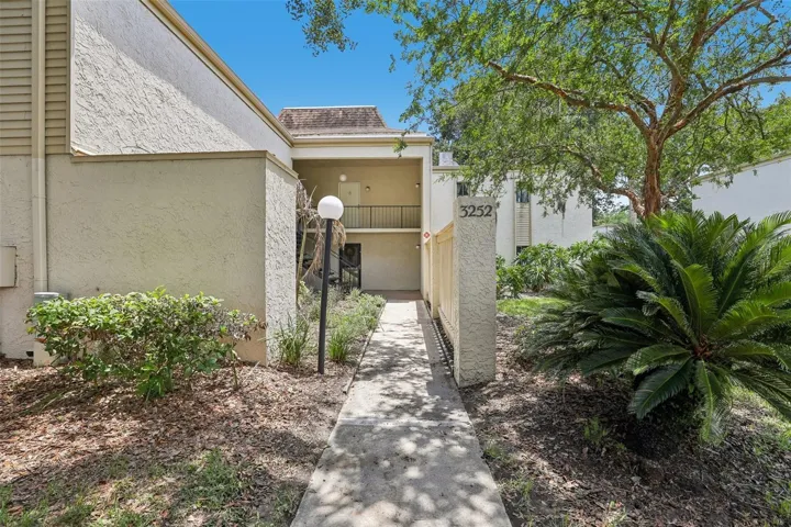 Welcome to the GATED Wimbledon community, where updated interiors, LOW MAINTENANCE LIVING, and an unbeatable East Orlando location come together in this inviting second-floor 2-bedroom, 2-bath condo!