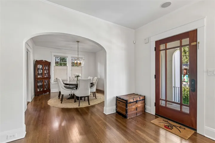 Arched entry way leads to a Dining room