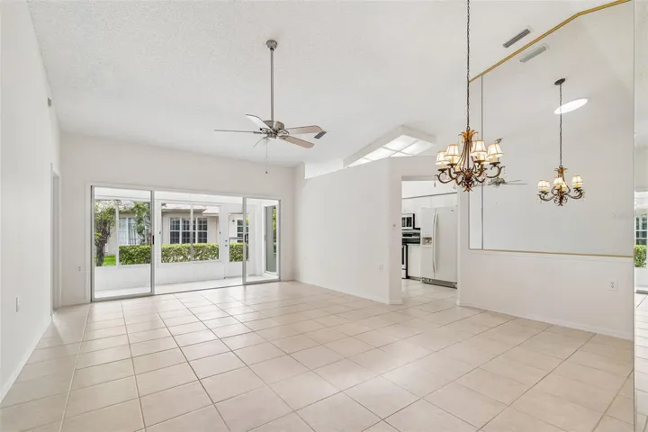 Great Room & Dining Area with sliders to Sun Room
