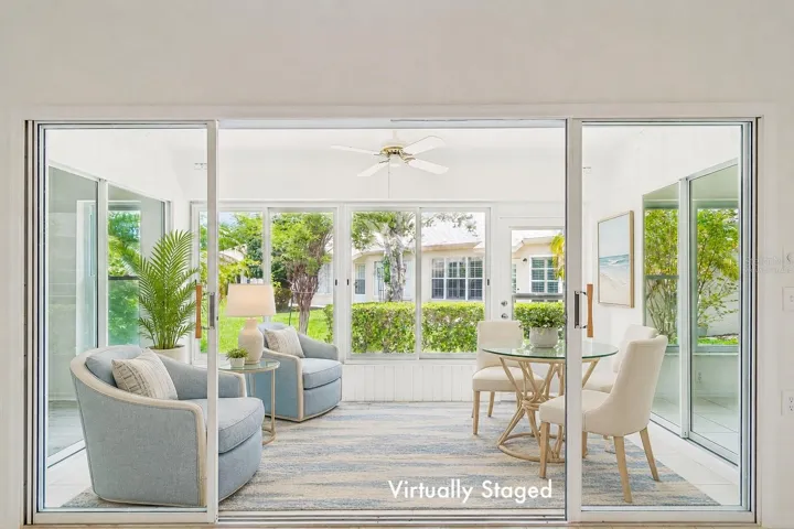 Virtually Staged Sun Room through sliders from Great Room