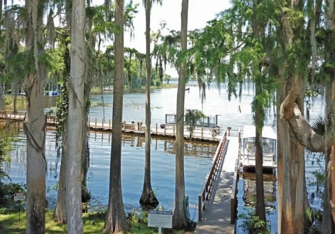 Dock on the lake with community pontoon boats w/ volunteer Captains