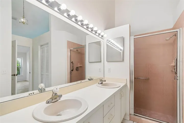 Primary Bathroom with dual sinks, shower