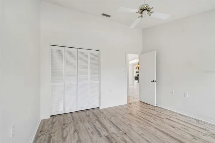 Bedroom 2 w/ vaulted ceiling