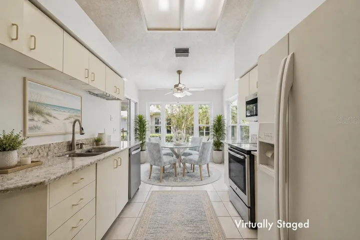 Virtually Staged. Light & bright eat-in Kitchen, vaulted ceilings