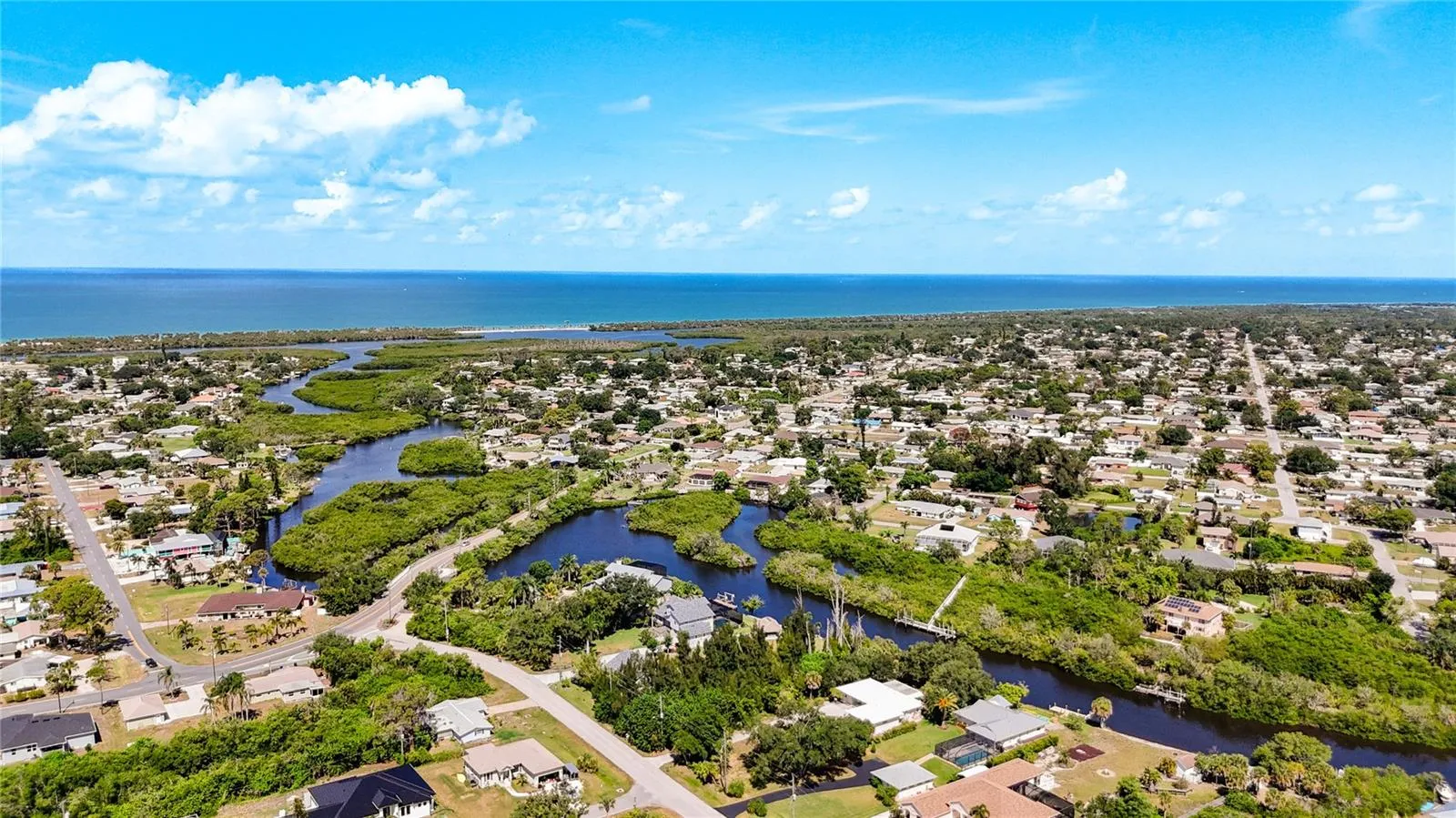 Aerial view showing creek network and Gulf proximity
