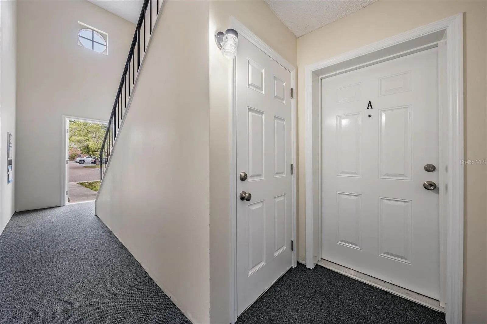 Entrance hall with storage closet for unit